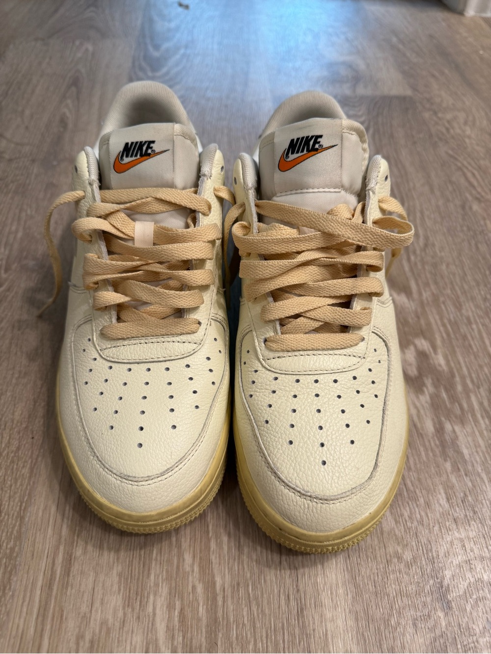 Nike Cream and Tan Low-Top Sneakers with Orange Swoosh